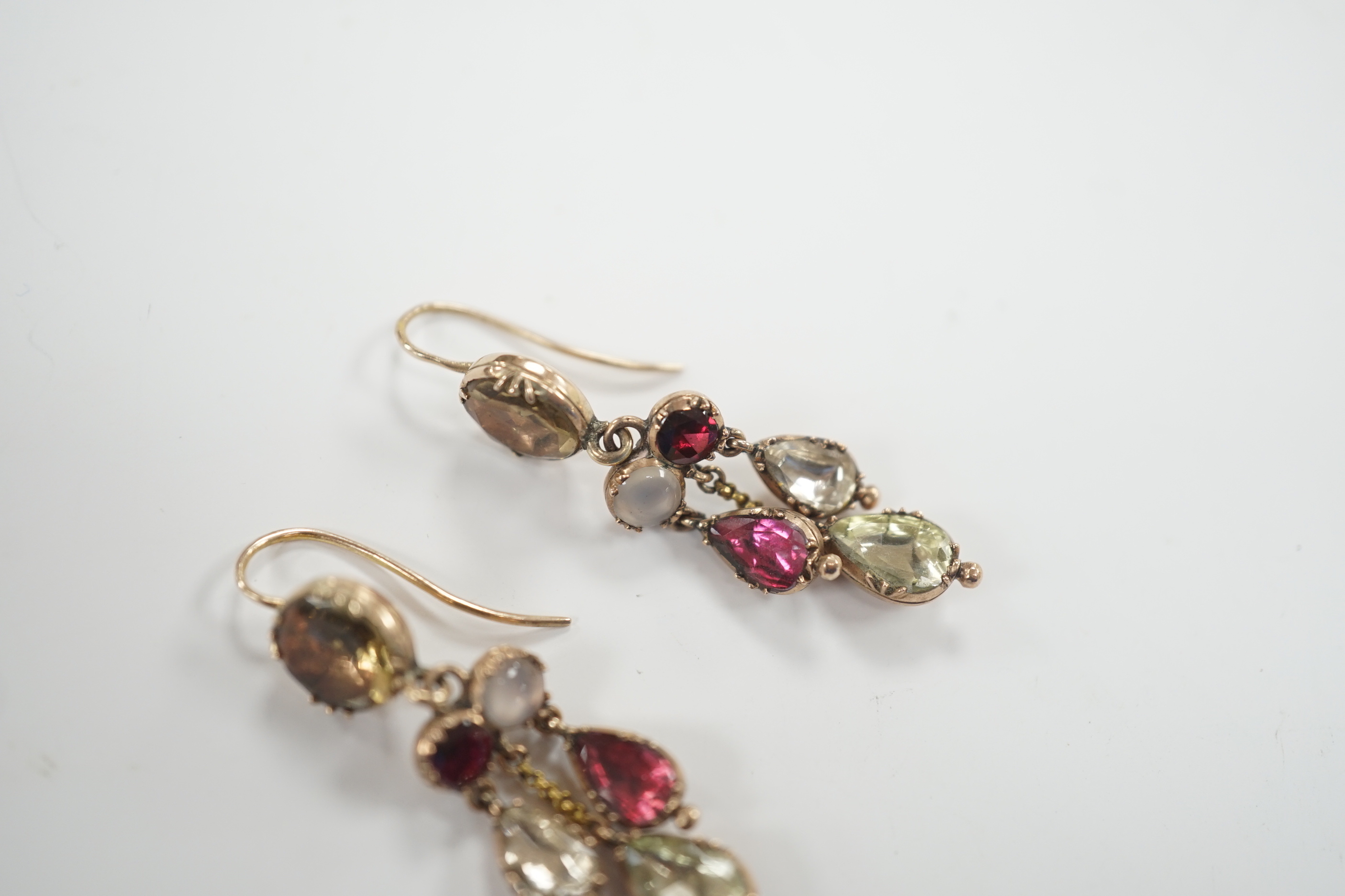 A pair of Victorian yellow metal and foil backed quartz set drop earrings, 35mm, gross weight 4.5 grams.